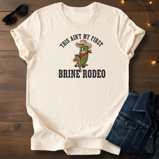 Brine Rodeo T‑Shirt — “This Ain’t My First Brine Rodeo” Funny Pickle Cowboy Tee
